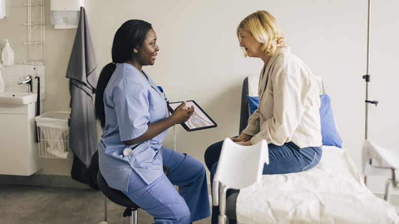 Mature woman in gynecology appointment