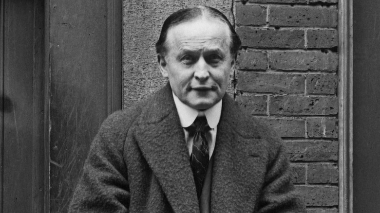 Hungarian-American escapologist Harry Houdini posing for photo