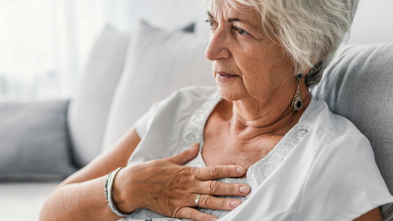 elderly woman with heartburn