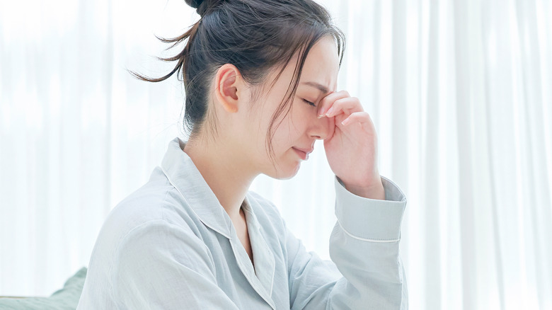 woman having trouble sleeping