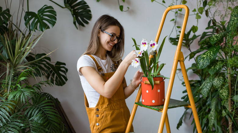 happy woman with plants