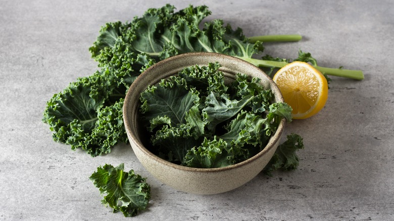 kale in bowl on marble surface