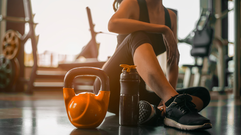 Girl at the gym with a kettlebell