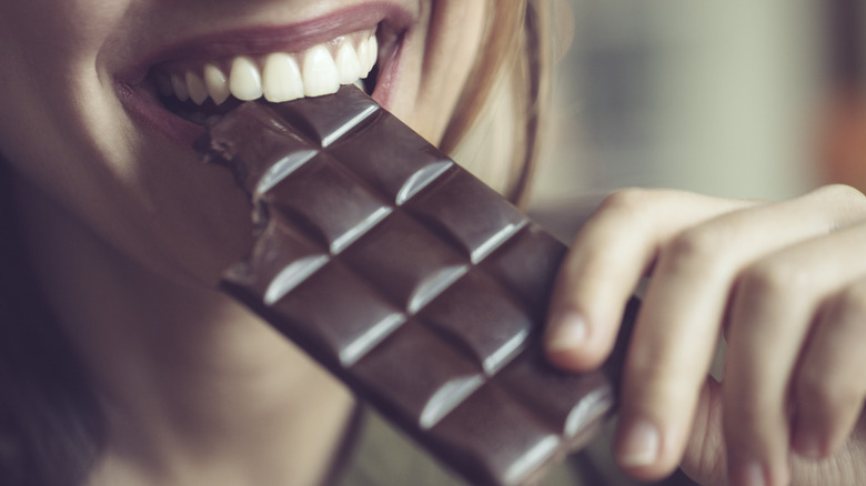 woman eating chocolate