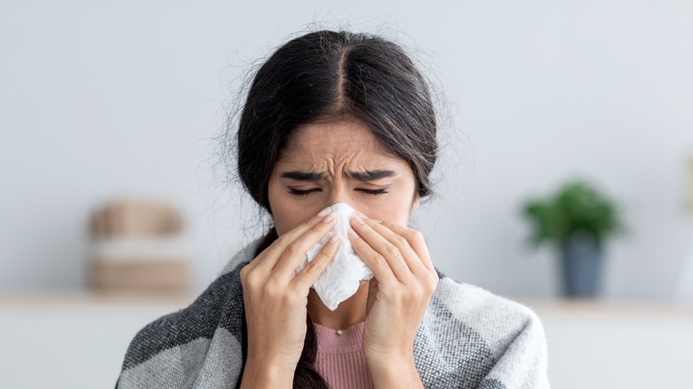 woman using tissue