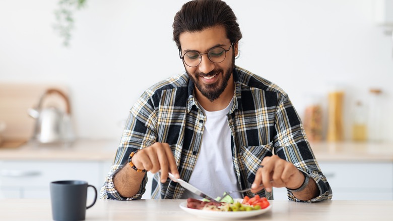 man eating healthy meal