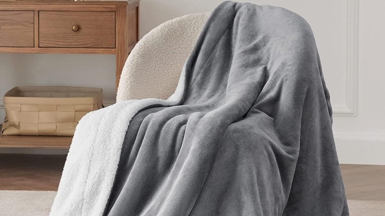 Grey blanket on chair
