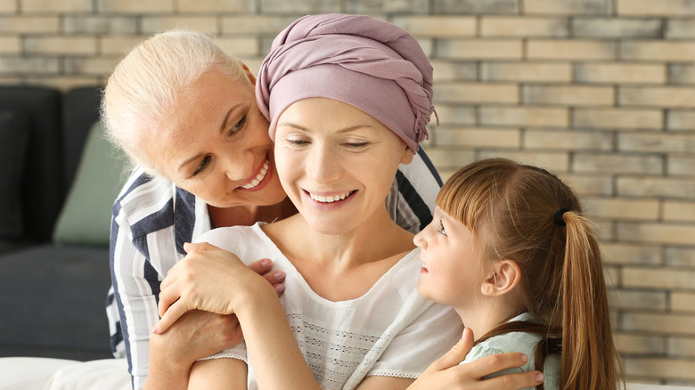 Cancer patient surrounded by family