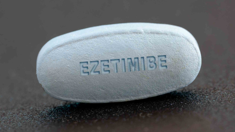 close up of cholesterol drug pill