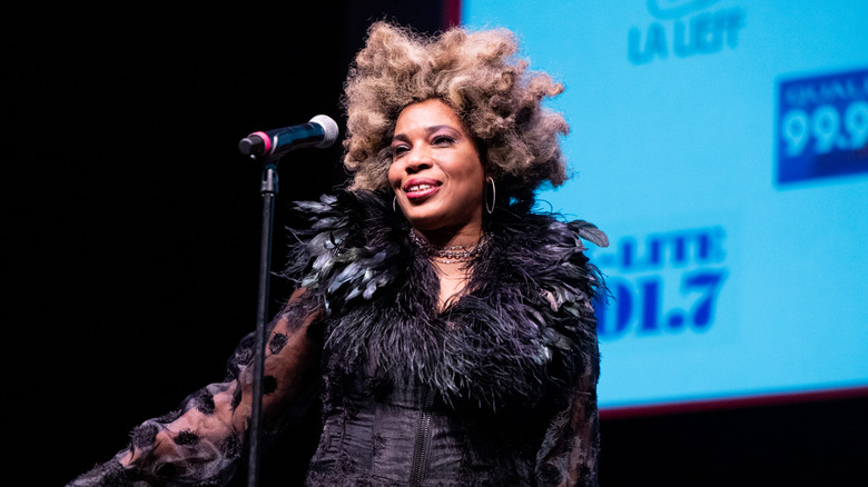 Macy Gray performing on a public stage