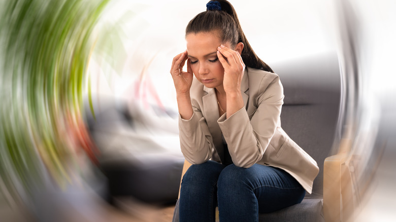 Woman feeling dizzy