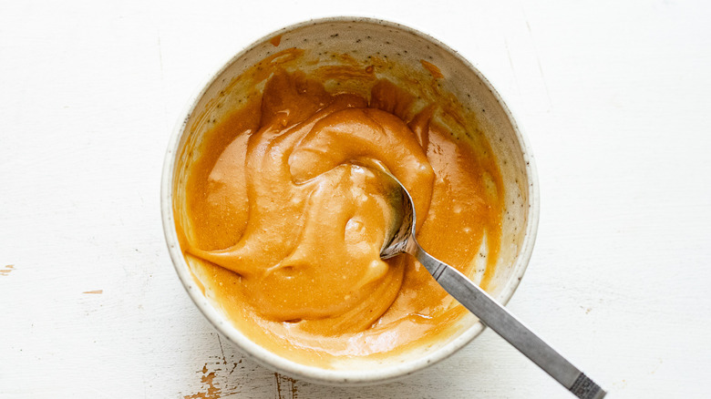 honey and peanut butter in bowl
