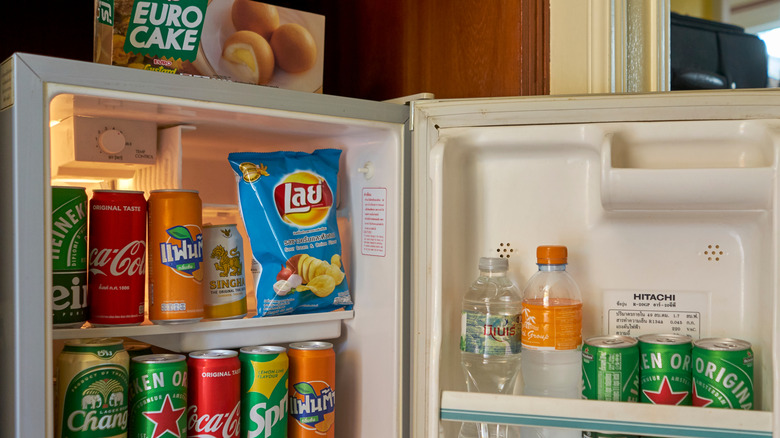 A stocked hotel room fridge