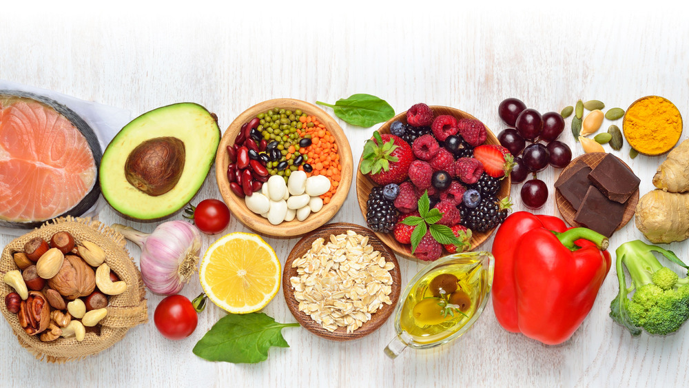 a variety of different healthy foods on a table