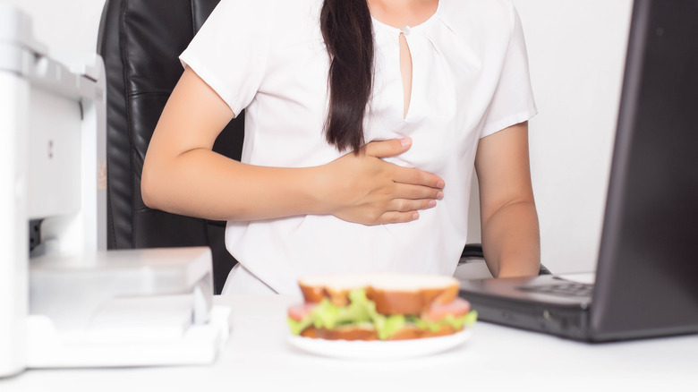 woman with stomach pain