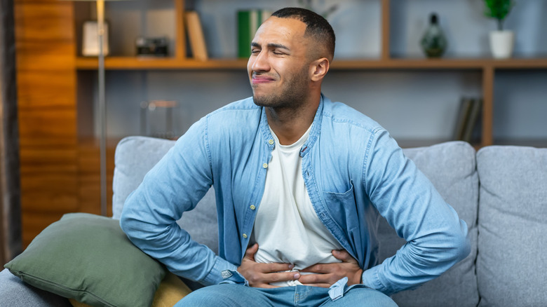 Man in pain with an upset stomach