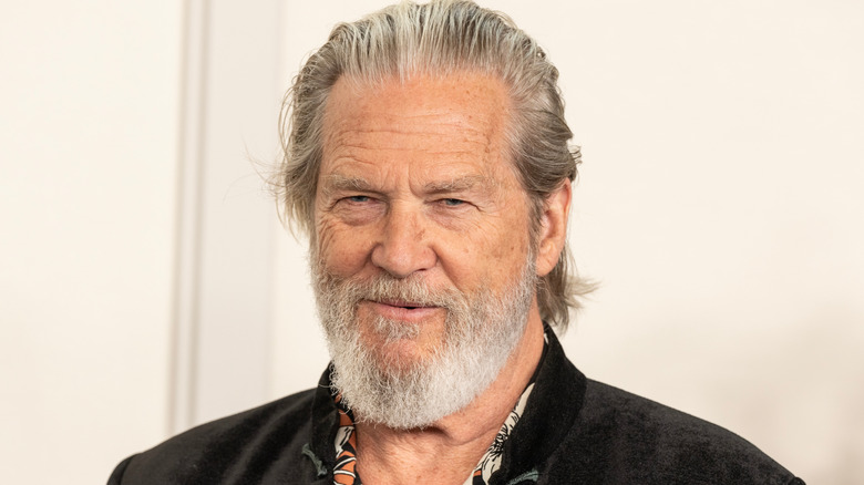 Jeff Bridges smiling during a publicity event after recovering from cancer and Covid