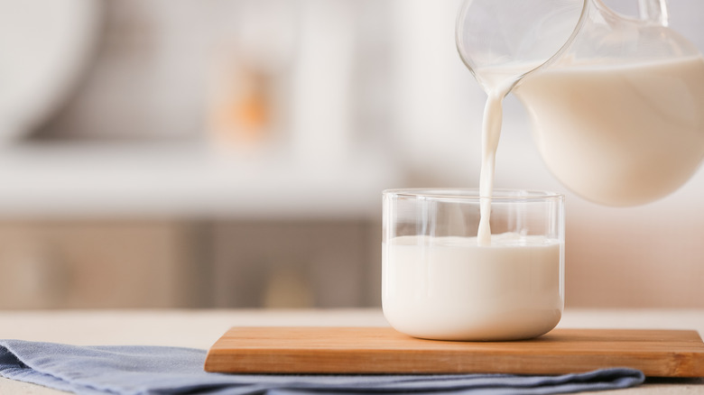 pouring milk into glass