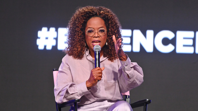 Oprah Winfrey talking into a microphone