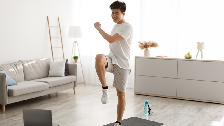 Man exercising at home