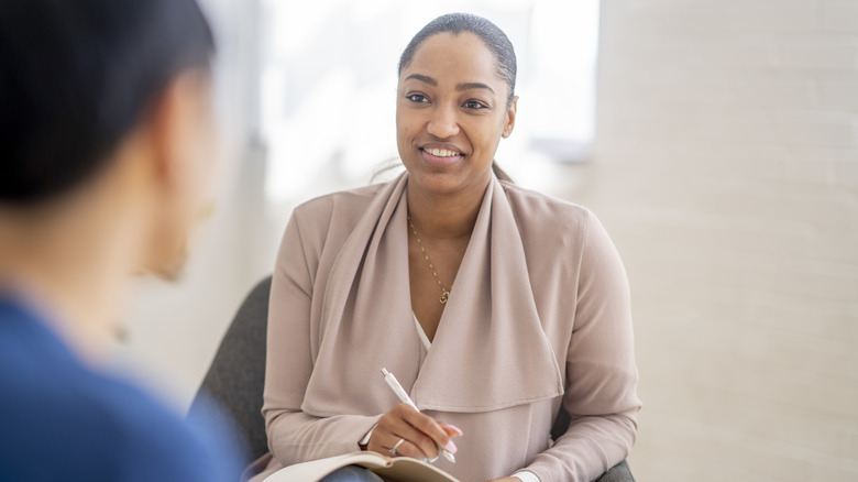 therapist talking with a client