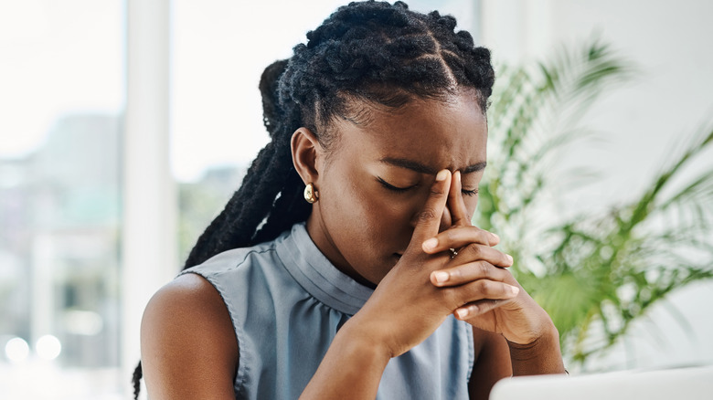 woman stressed out at work