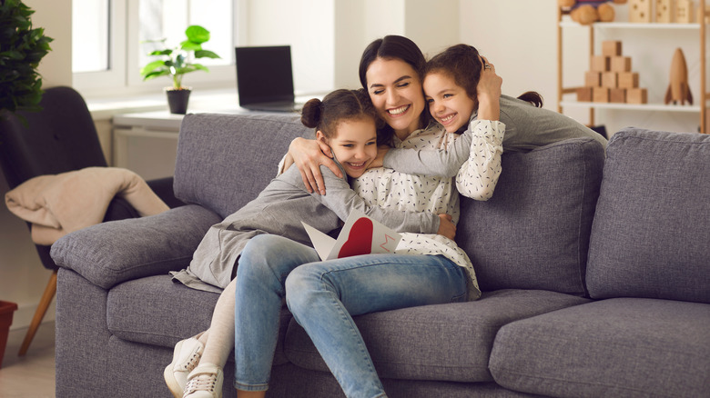 Mother with two young children