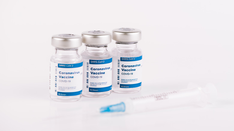 three vials of COVID-19 vaccine