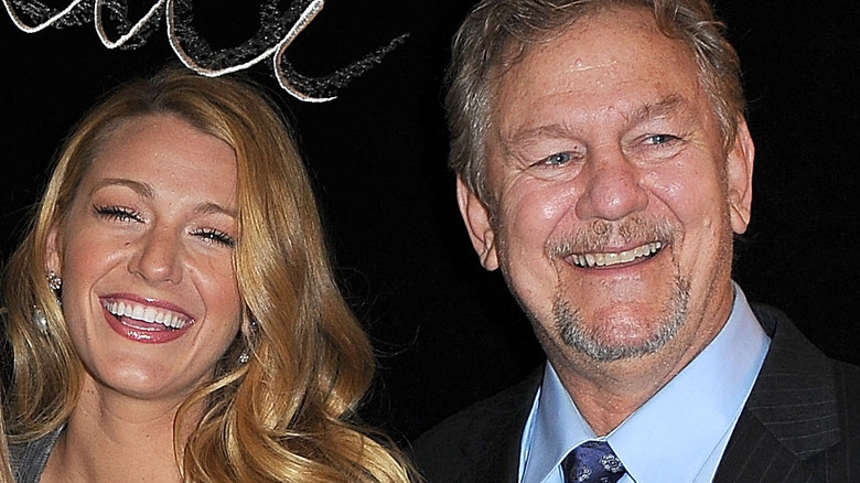 Blake Lively and Ernie Lively standing together at a premiere