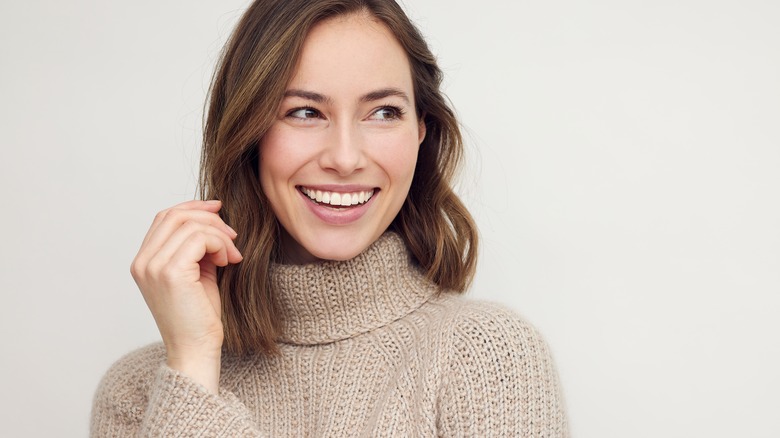 healthy young woman looking off camera