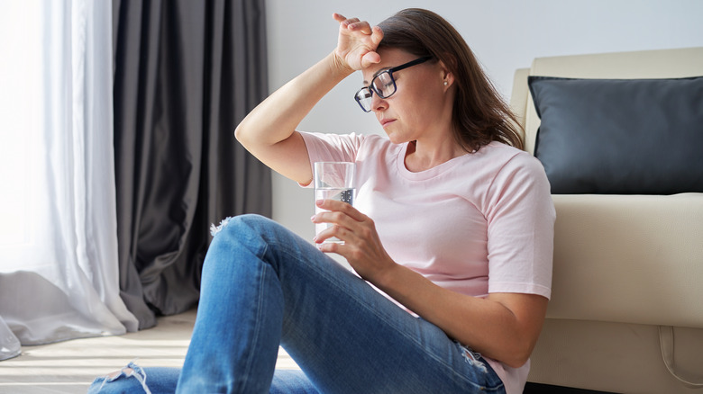 middle-aged woman feeling stressed