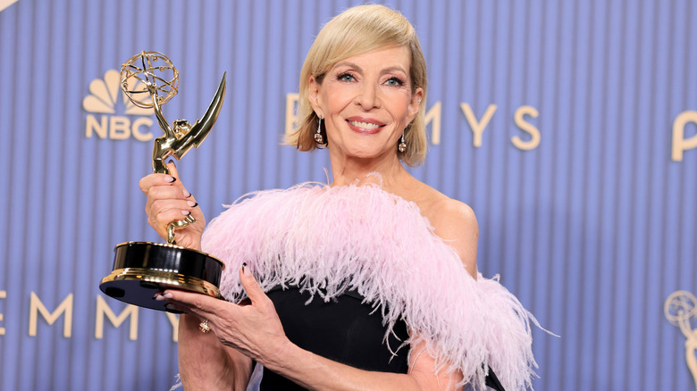 Allison Janney posing with her Emmy