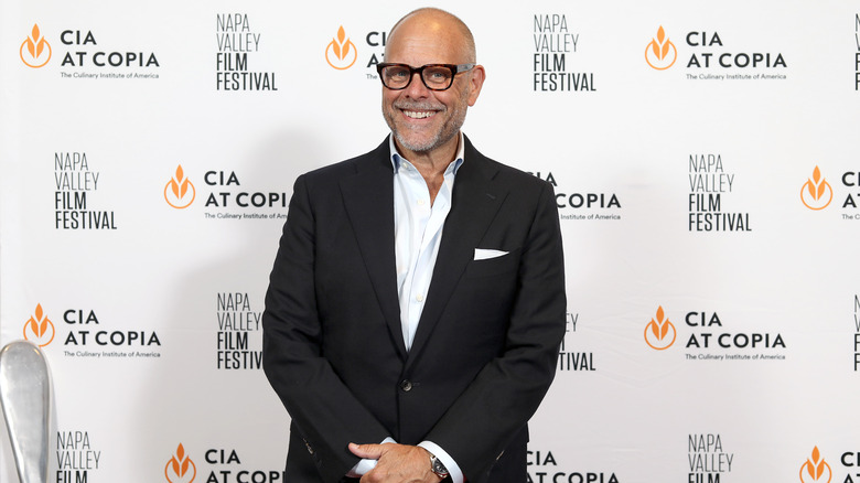 Alton Brown smiling at event