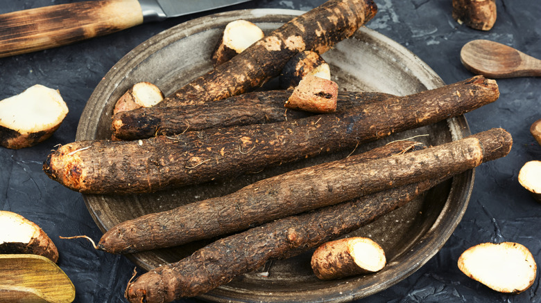 Stalks of salsify root vegetable on a plate