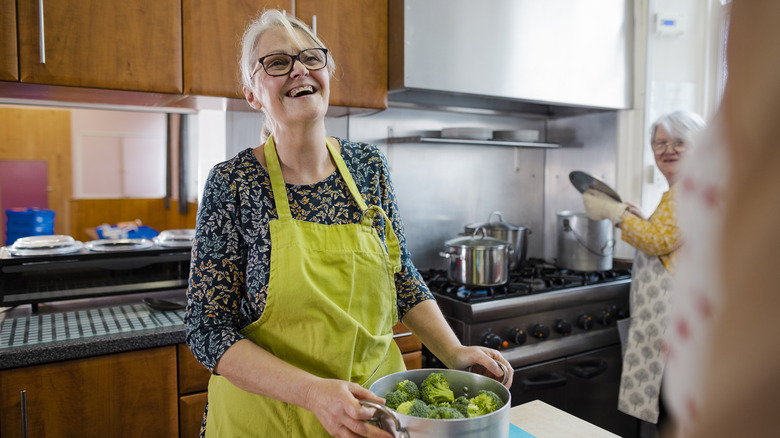 women broccoli pot kitchen