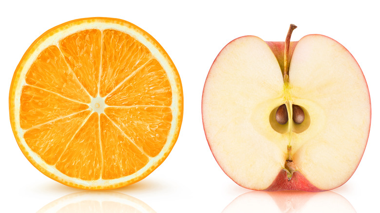 orange and apple side by side