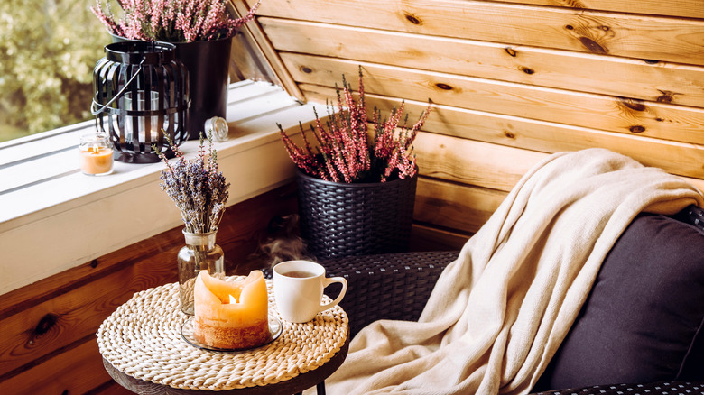 burning candles in a corner nook