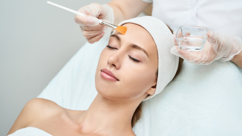 Woman getting chemical peel