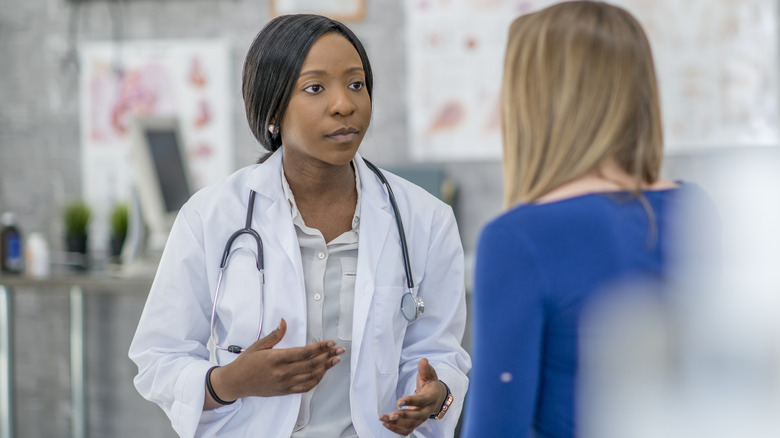 Doctor explaining diagnosis to patient