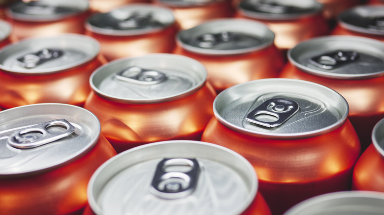 Orange energy drink cans