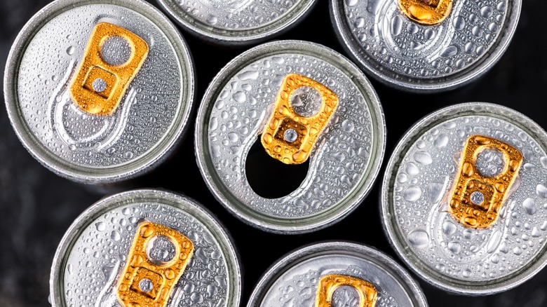 tops of energy drink cans