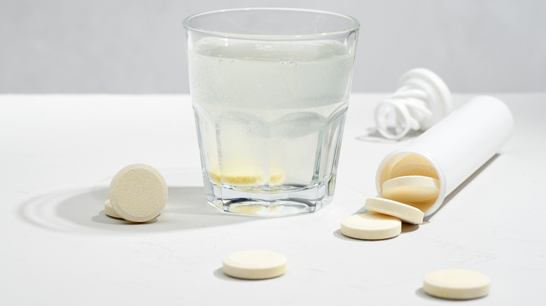 Tablets and glass of water