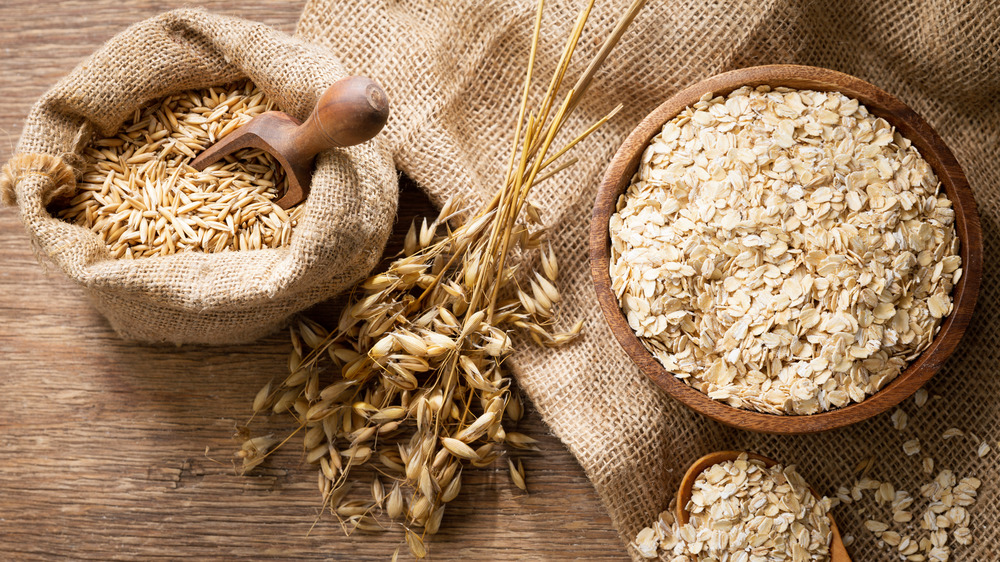 A wooden bowl of oats