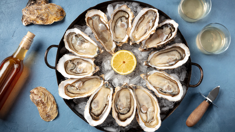 several oysters and a lemon