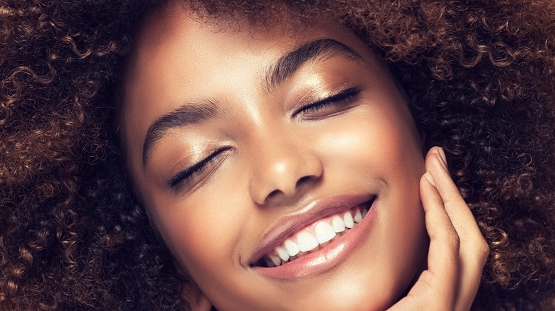 black girl showing a beautiful smile with white teeth