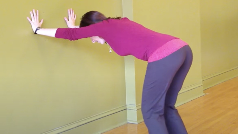 woman doing L stretch