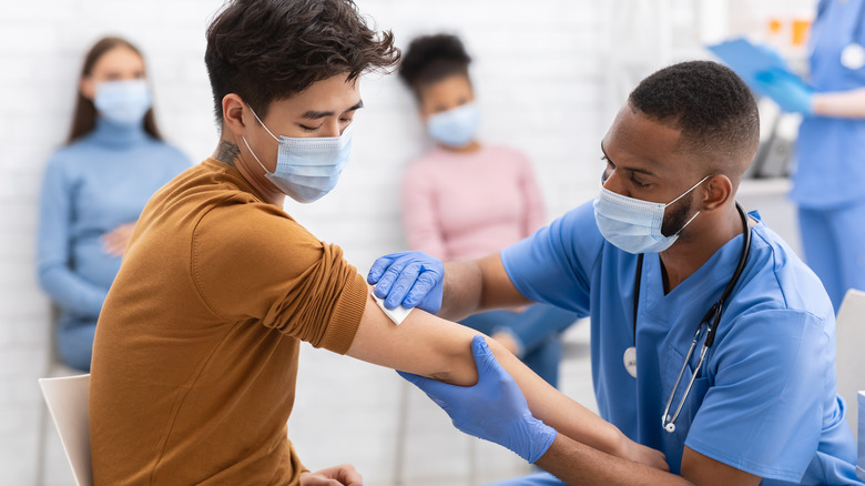 man getting vaccinated