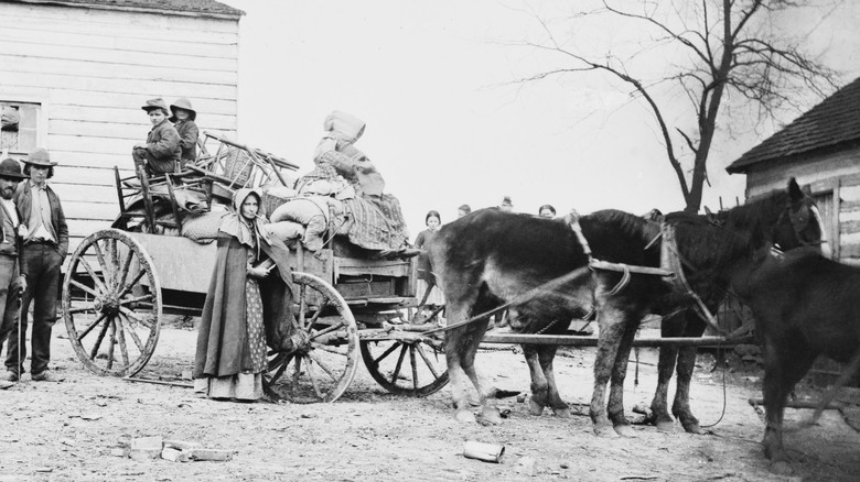 A pioneer family in a wagon