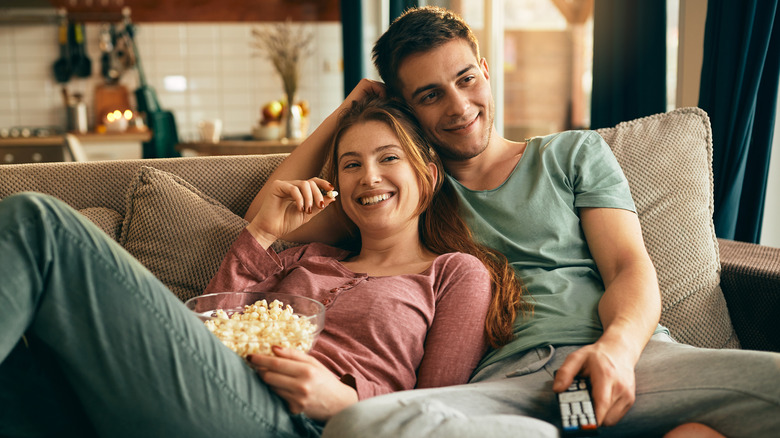 bowl of popcorn in front of TV