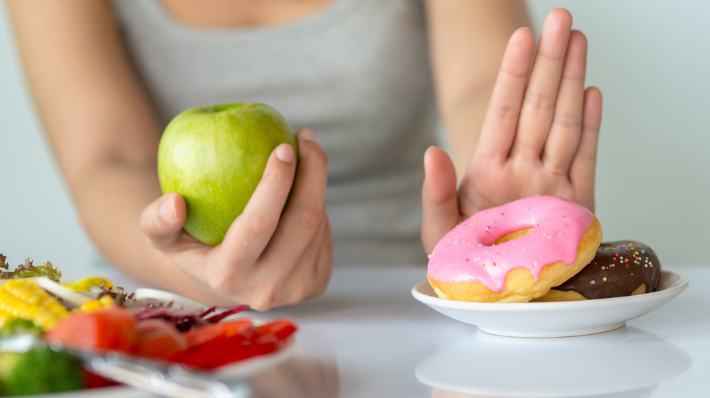 choosing apple over donuts